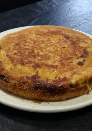 Una foto de Pastel de papas y zucchini en sartén