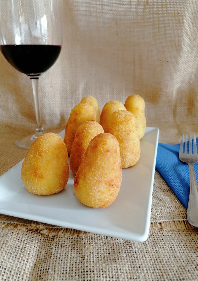 Una foto de Arancini sicilianas