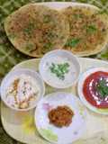 DELICIOUS AALOO PARATHA WITH RAAIYTA ACHAR KETCHUP & TEA