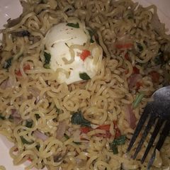 A picture of Indomie and boiled egg.