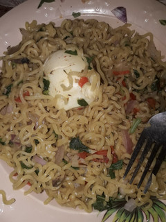 A picture of Indomie and boiled egg.