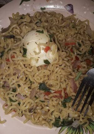 A picture of Indomie and boiled egg.