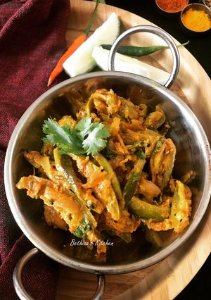 A picture of Aam Shorshe Potol (Parwal cooked with Mustard-Raw Mango Paste - Bong Style).