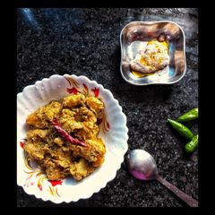 A picture of Aloo Posto.
