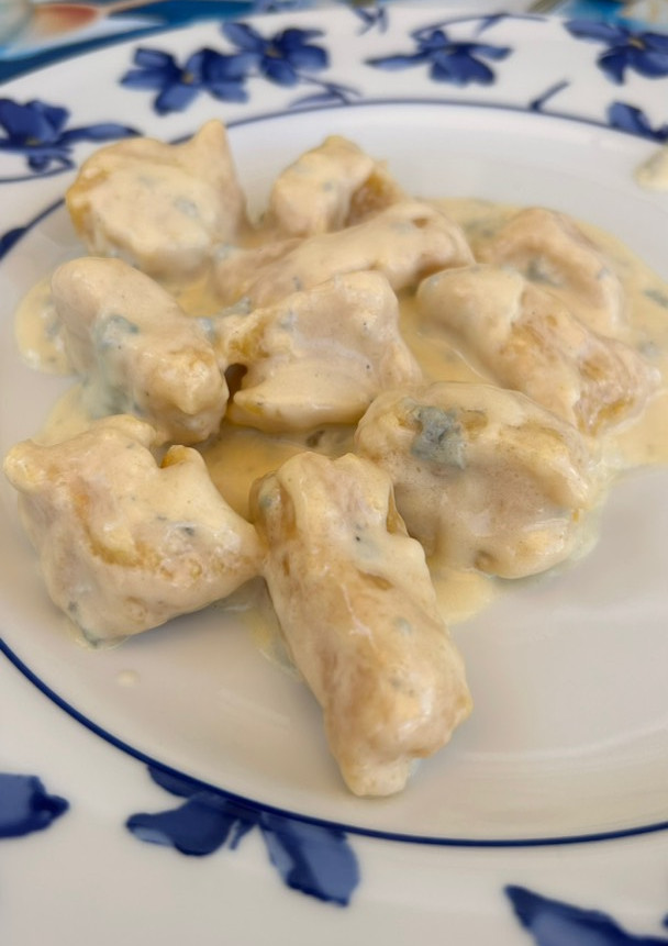 Una foto de Gnocchis de calabaza en salsa gorgonzola