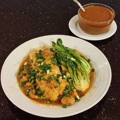 A picture of Hot, Sweet and Sour Poached Fish Fillets with Mushrooms and Baby Bok Choy.