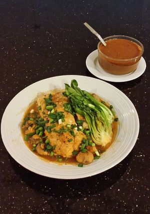 A picture of Hot, Sweet and Sour Poached Fish Fillets with Mushrooms and Baby Bok Choy.