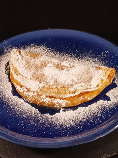 Una foto de Tortilla dulce flambeada al ron