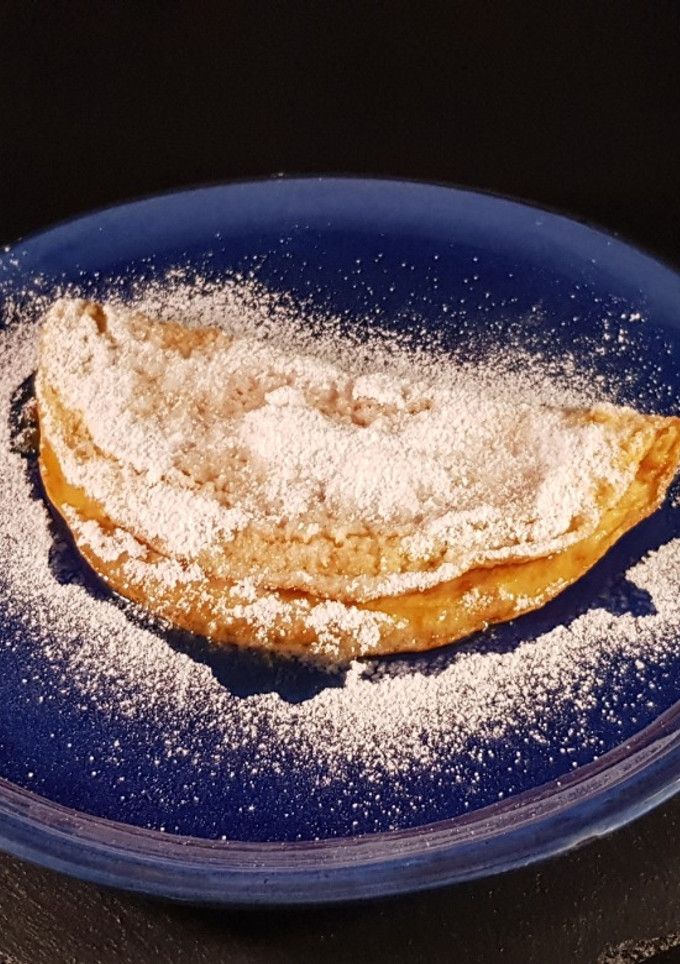 Una foto de Tortilla dulce flambeada al ron