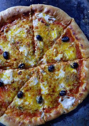 Une photo de Pizza aux fromages 🍕 🧀