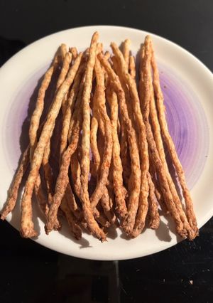 A picture of Turkey and cheese sticks for dogs.