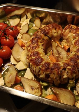 A picture of Swedish falukorv (sausage) in oven with roasted vegetable & pear.