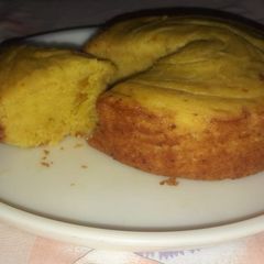 Egg less mango cake in cooker A picture of Egg less mango cake in cooker.