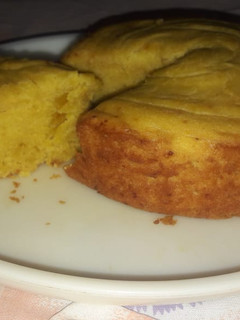 A picture of Egg less mango cake in cooker.
