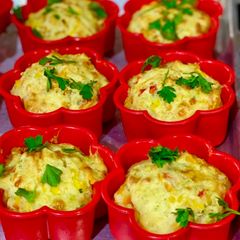 A picture of Cheddar and bell pepper muffins.