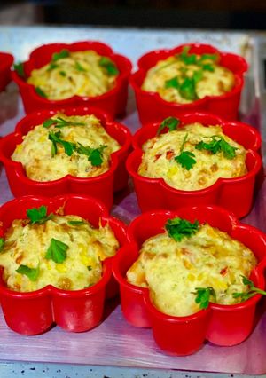 A picture of Cheddar and bell pepper muffins.