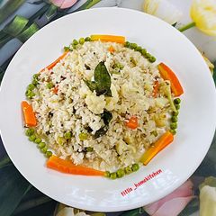 A picture of Bengali Chirer Pulao(Bengali Poha).