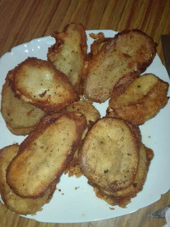 Una foto de Librito de berenjena relleno de jamón york queso y bacon