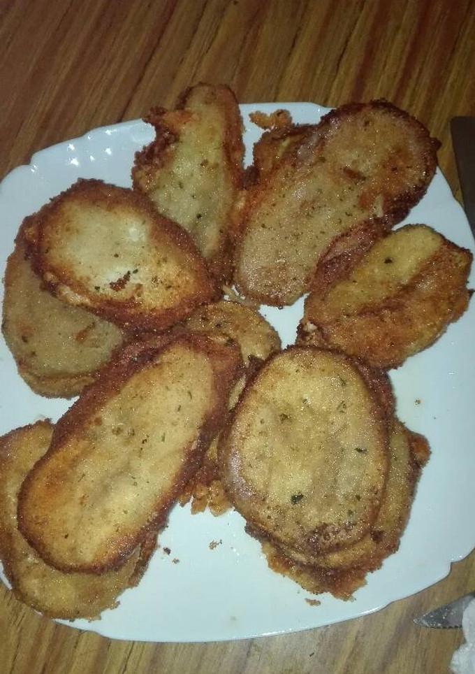 Una foto de Librito de berenjena relleno de jamón york queso y bacon