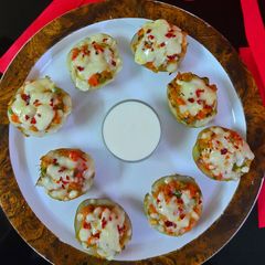 A picture of Maxican stuffed potato jackets.