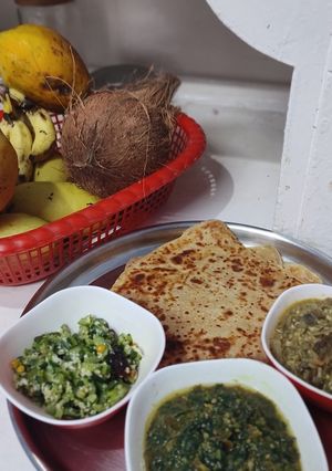 A picture of #HBC# Jowar Panner paratha,saag,snake gaurd,banana steam subji.