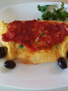 Una foto de Tortilla de pimientos y quesos