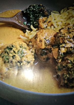 A picture of Spinach Kofta With Creamy tomato curry.