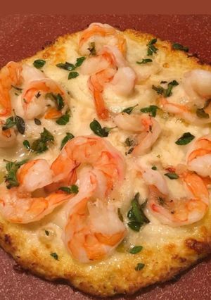 A picture of Shrimp Scampi Pizza on Cauliflower Crust.
