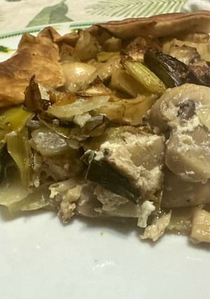 Una foto de Tarta de pollo, puerro y champiñones