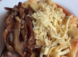 Una foto de Cordero al horno con ñoquis de papas en salsa