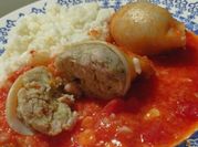 Una foto de calamar en salsa de tomate