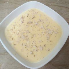A picture of Vanilla custard with coconut.