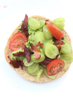 A picture of Avocado With Grape And Bacon Salad On Pita Bread.