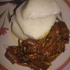 A picture of Boiled yam and ugba sauce.