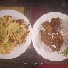 Chicken kali mirch with chur chur naan A picture of Chicken kali mirch with chur chur naan.