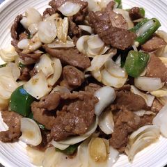 A picture of Sauteed Beef in Lotus Buds.