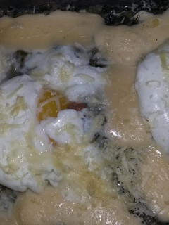 Una foto de Huevos en colchón de espinaca y acelga