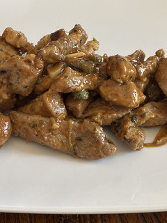 Una foto de Cerdo con orégano al wok