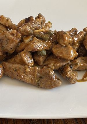 Una foto de Cerdo con orégano al wok
