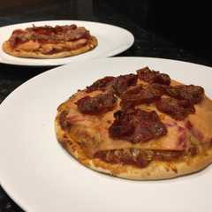 Una foto de Pizza de salmón