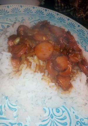 Una foto de Tuco de panchos con arroz