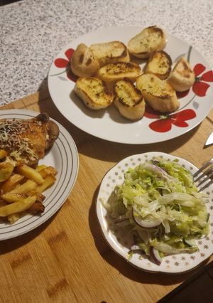 O poză a rețetei Fried potatoes with chicken leg and salad night menu.