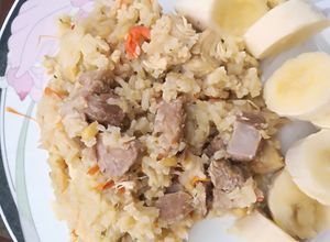 Una foto de 💥 Arroz Mix de Cerdo y Pollo🔥