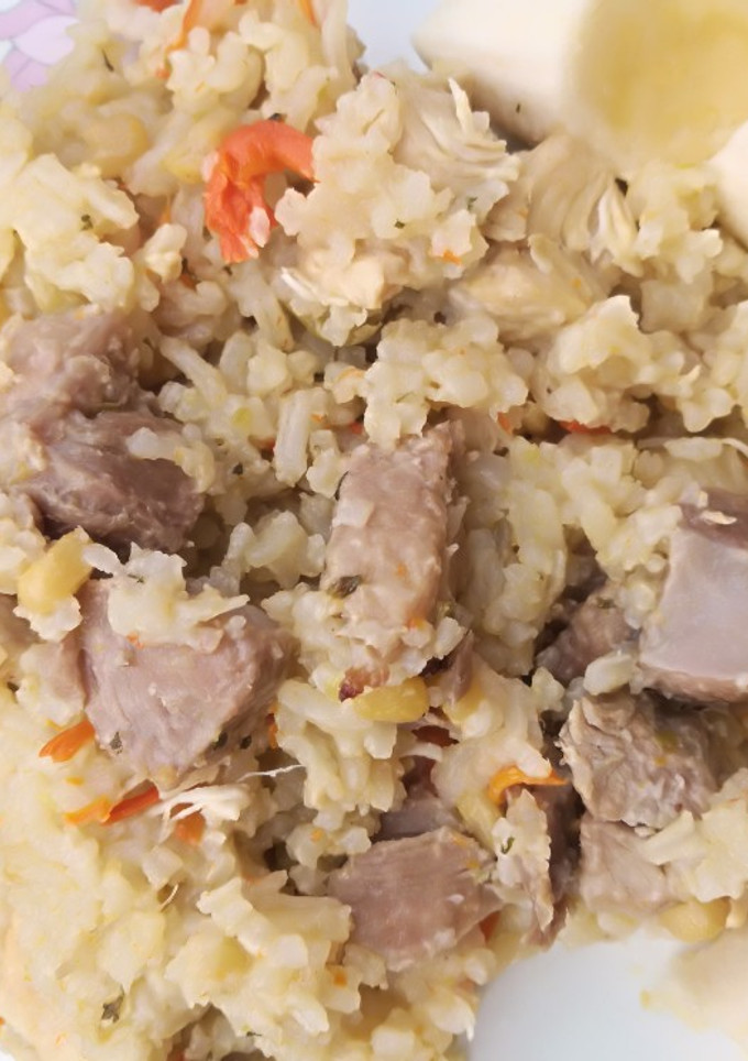 Una foto de 💥 Arroz Mix de Cerdo y Pollo🔥