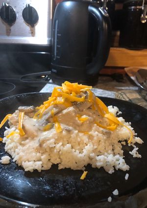 A picture of Chicken and Rice with Mushroom Sauce.