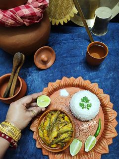 পুঁটিমাছের টক ঝাল (Puti macher tok jhal recipe in Bengali) রেসিপির প্রধান ছবি