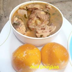 A picture of Nsala soup with chicken & cat fish.