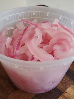 A picture of Pickled Red Onions.
