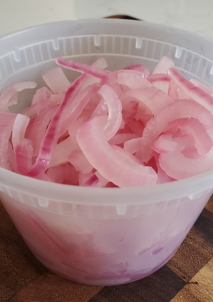 A picture of Pickled Red Onions.