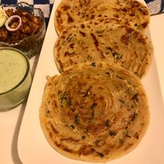 A picture of Crispy Multilayered Butter Garlic Paratha.